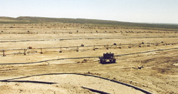 The range near the city of Uchkuduk. Advanced technology gives the uranium mining process the appearance of oil production. But only on the surface.