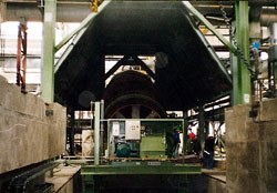 Tilting and rotating fuel-oxygen converter to process scrap with the copper content between 56 % and 92 %